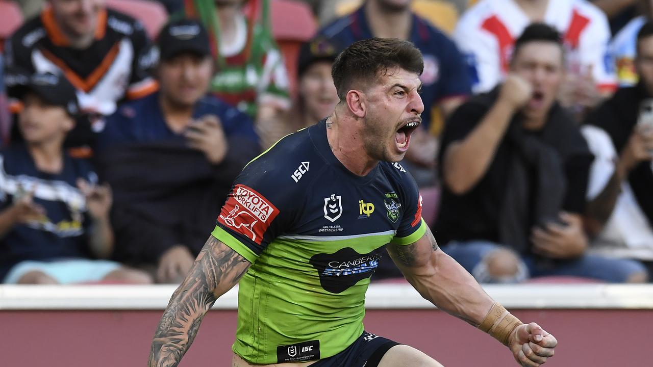 BRISBANE, AUSTRALIA – MAY 15: Curtis Scott of the Raiders celebrates with teammates after scoring a try during the round 10 NRL match between the Canterbury Bulldogs and the Canberra Raiders at Suncorp Stadium, on May 15, 2021, in Brisbane, Australia. (Photo by Albert Perez/Getty Images)