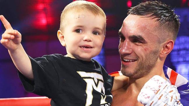 Andrew Moloney with his son Lee after the Kingscliffe boxer's win against Gilberto Mendoza. Mikey Williams/Top Rank Boxing