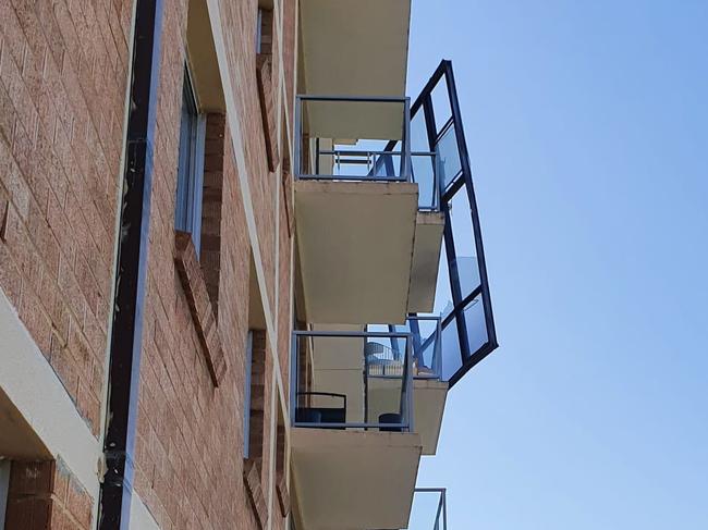 Wild winds tore a large window out of an apartment block in Paddington. Picture: Supplied