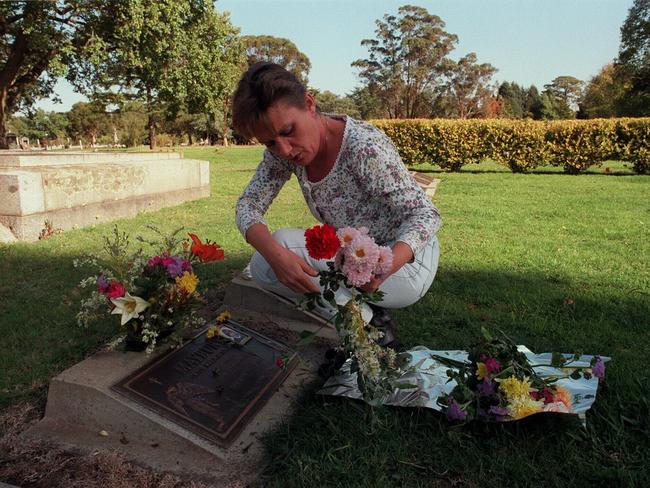 Julie Maybury visits the grave of her daughter Kylie 13 years after she was found brutally murdered.