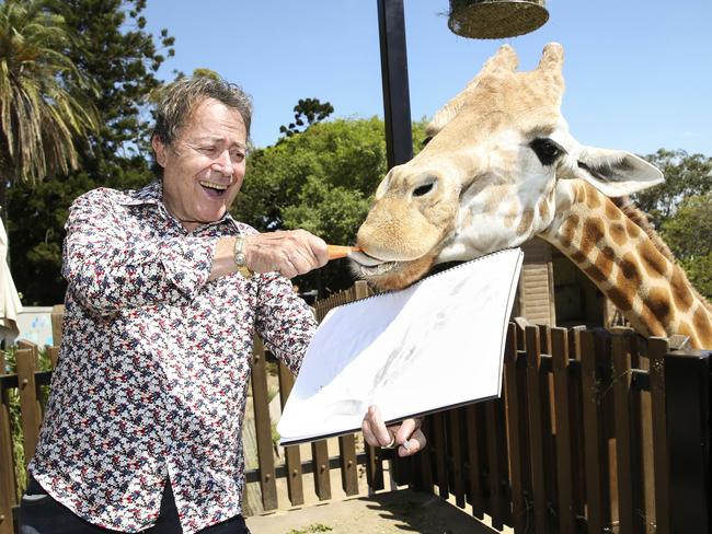 Billich at Taronga Zoo, after painting an oil to be auctioned off at Taronga Zoo’s gala night in support of its 100th birthday. Picture: Justin Lloyd