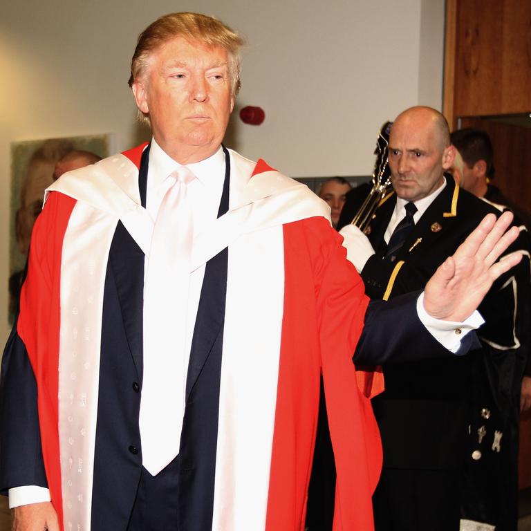 Donald Trump stands in his ceremonial robes before recieving his honourary award of Doctor of Business Administration from Robert Gordon University on October 8, 2010 in Aberdeen, Scotland. Picture: Getty