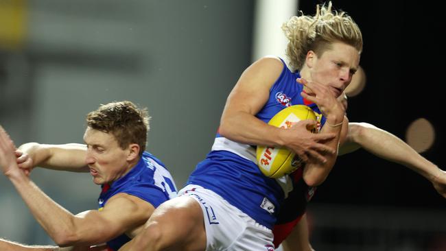 First-gamer Cody Weightman flies for a contested mark before converting from the boundary line with his first kick. Picture: Michael Klein