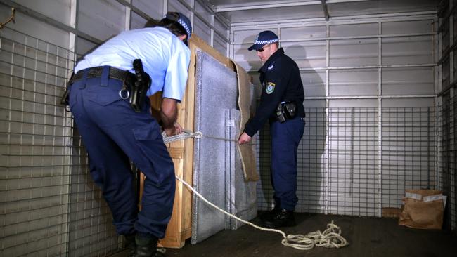 Police in 2008 seize works described by Kevin Rudd as ‘revolting’.