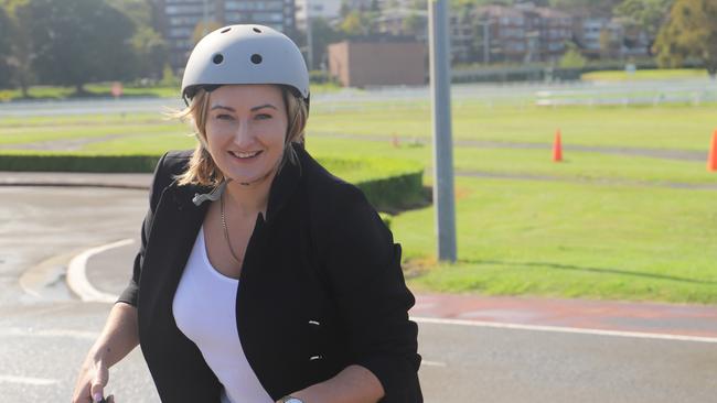 Coogee MP Dr Marjorie O'Neill tries out a one wheel.