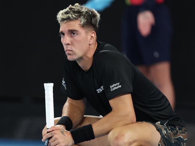 MELBOURNE, AUSTRALIA - JANUARY 19:  Thanasi Kokkinakis of Australia shows his dejection during his five set defeat in their round two singles match against Andy Murray of Great Britain during day four of the 2023 Australian Open at Melbourne Park on January 19, 2023 in Melbourne, Australia. (Photo by Clive Brunskill/Getty Images)