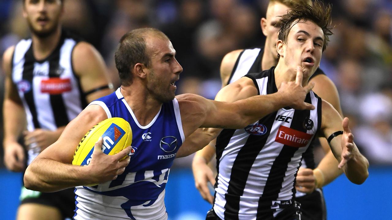 Ben Cunnington fends off Callum Brown on Saturday night.