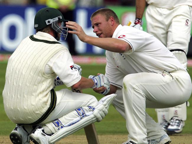 Andrew Flintoff shakes hands with Brett Lee after the epic finish.