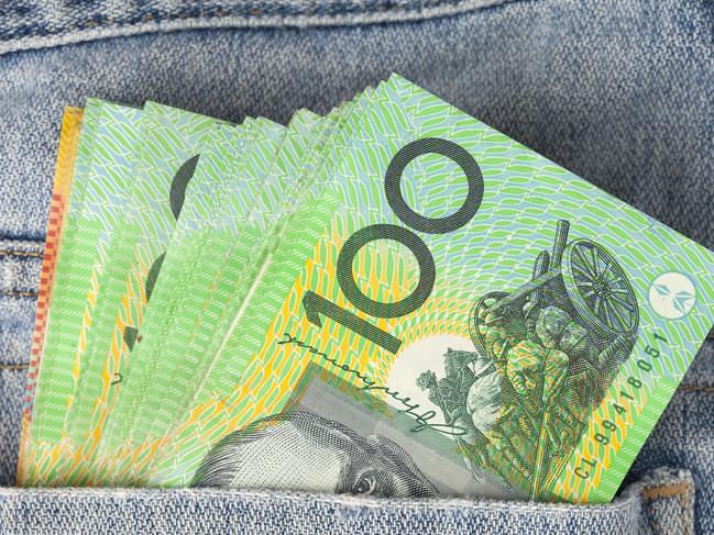 Australian 100 dollar notes in jeans pocket. money, wealthy, rich generic
