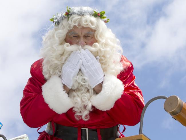 National Pharmacies Christmas Pageant - Santa atop his reindeer driven sleigh. Father Christmas is on his way to greet onlookers from the Adelaide Town Hall balcony. Adelaide Christmas Pageant 2019. AAP/Emma Brasier.