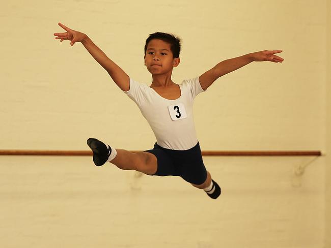 Oliver takes to the air in convincing style during preparations for his end-of-year assessment at the Royal Academy of Dance headquarters at Darlinghurst.