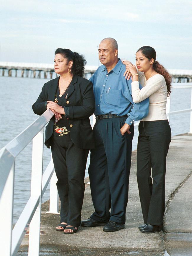 Sonia (daughter), Vijay (father) and Shirley (mother) take time out at the Sandgate jetty after the murder of their children and siblings Neelma, Kunal and Sidhi.