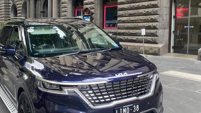 A private hire vehicle parked outside Town Hall on Swanston St on March 12, 2023.