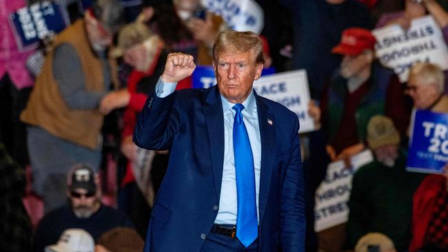 Former US president and 2024 presidential candidate Donald Trump leaves after speaking at a campaign rally in Claremont, New Hampshire, on November 11, 2023. (Photo by JOSEPH PREZIOSO / AFP)