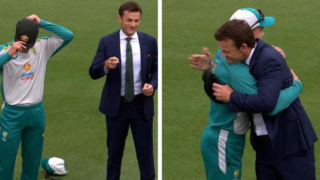 Alex Carey receives his cap from Adam Gilchrist.