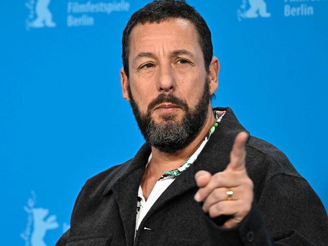 US actor Adam Sandler poses during a photo call for the film 'Spaceman' presented in the Berlinale Special Gala at the 74th Berlinale, Europe's first major film festival of the year, in Berlin on February 21, 2024. (Photo by Tobias SCHWARZ / AFP)