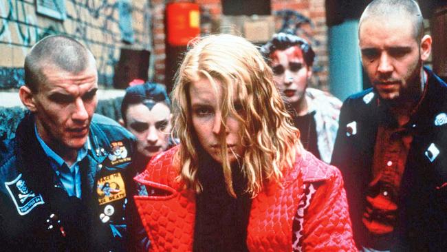 McKenzie made her big-screen debut in 1992 film Romper Stomper, in which she played opposite her then-lover Daniel Pollock (left) and Russell Crowe (right).