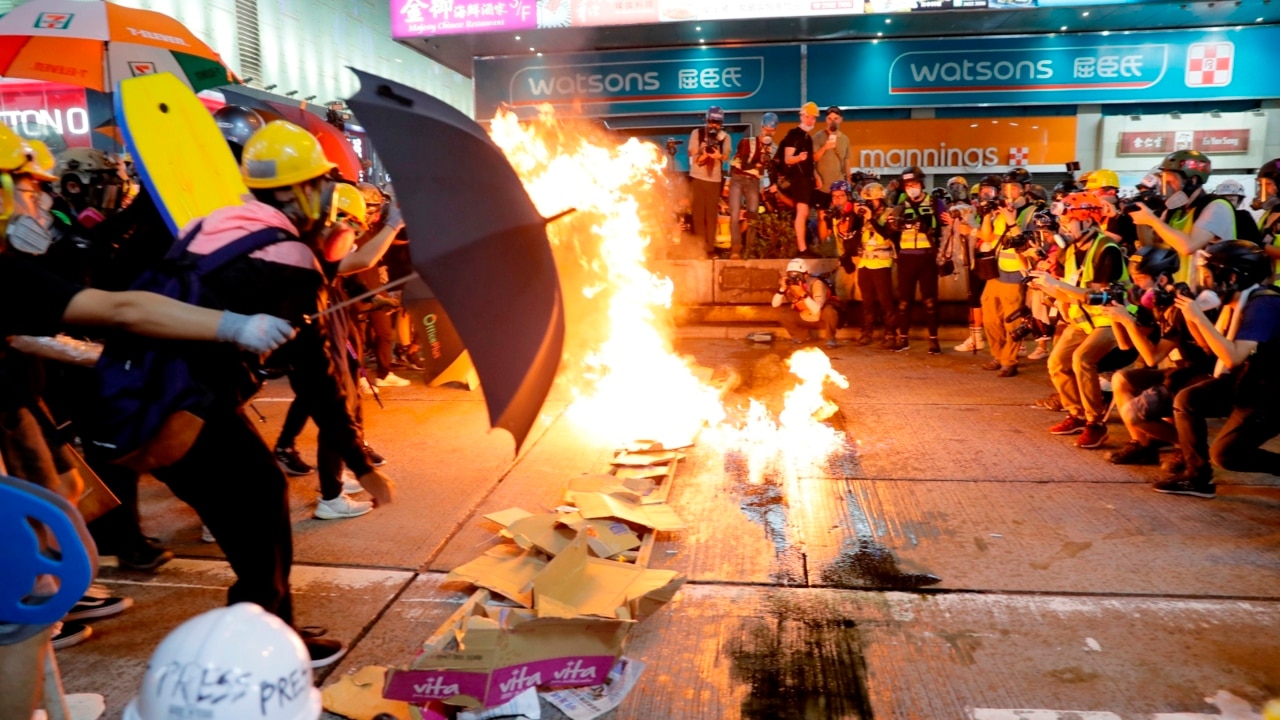 Protesters shot, burned in Hong Kong demonstrations