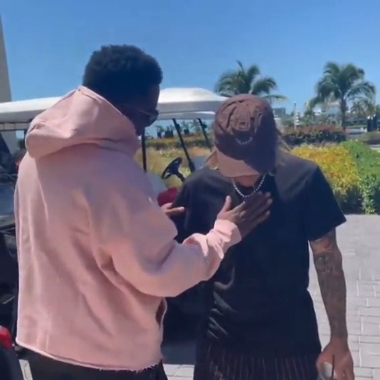 Social media users believe it looks as though Diddy is checking the singer for a wire as he repeatedly patted Bieber on his chest. Picture: DianaWallace888/X