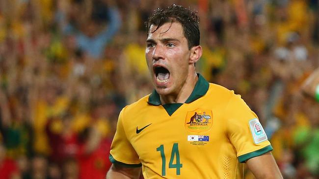 SYDNEY, AUSTRALIA - JANUARY 31: James Troisi of Australia celebrates after scoring a goal during the 2015 Asian Cup final match between Korea Republic and the Australian Socceroos at ANZ Stadium on January 31, 2015 in Sydney, Australia. (Photo by Mark Kolbe/Getty Images)