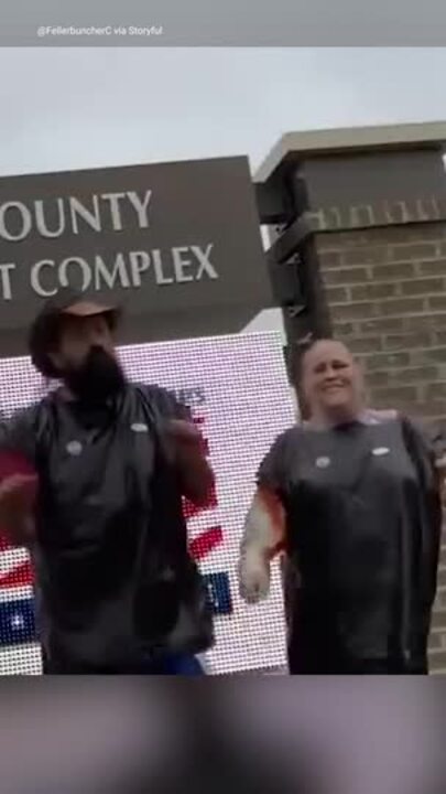 Trump supporters show up to polls wearing garbage bags