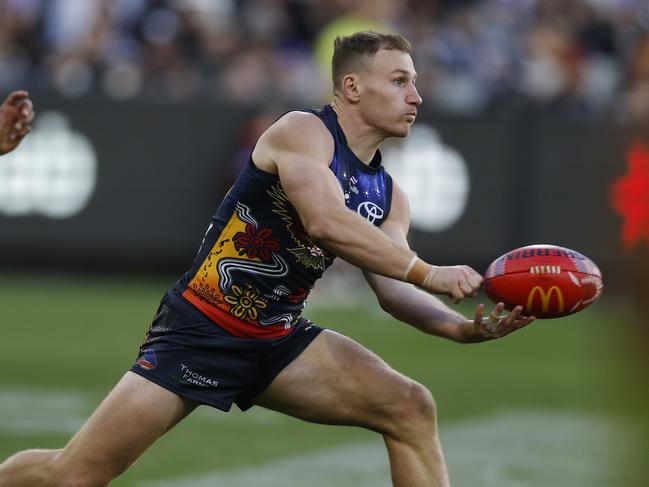 Rory Laird fires a handball clear the last time the Crows played at the MCG. Picture: Michael Klein