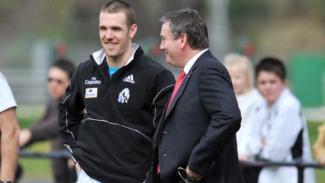 Eddie McGuire with Dane Swan at a Collingwood training session in 2010.