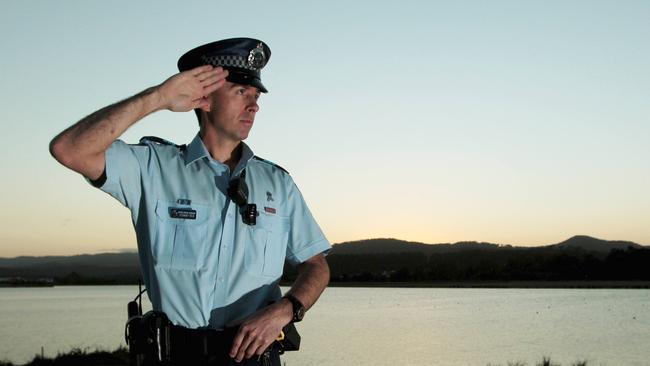 Acting Senior Sergeant Stewart Reid remembers his fallen colleague at the Damian Leeding Memorial Park, Oxenford.