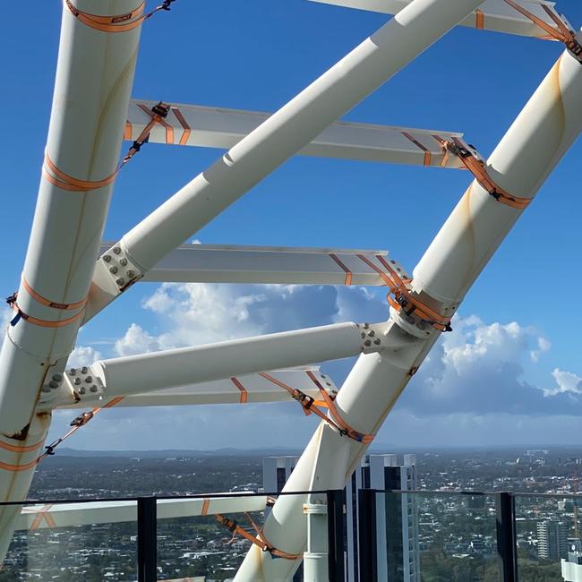 Ratchet straps covering a structure on top of The Oracle Hinterland Tower at Broadbeach. Picture: Supplied