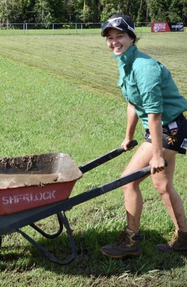 Kristen Firth doing her bit to ensure the Orora fields are in a playable condition. Excessive rain has caused the fields to become sponges. .