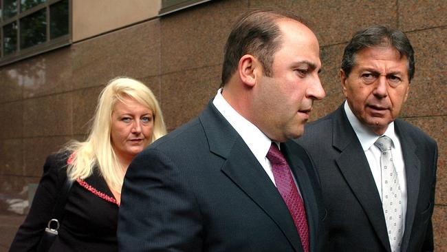 Working in the background: Gobbo with client Tony Mokbel and Con Heliotis QC.