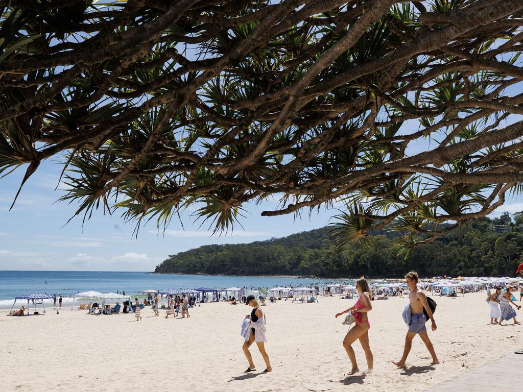 Holiday crowds at Noosa Main Beach. Picture Lachie Millard