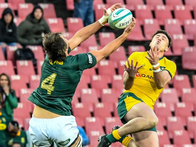 Eben Etzebeth of the Springboks fights for possession with Tom Banks of Australia off a high kick. Picture: Sydney Seshibedi/Gallo Images/Getty Images