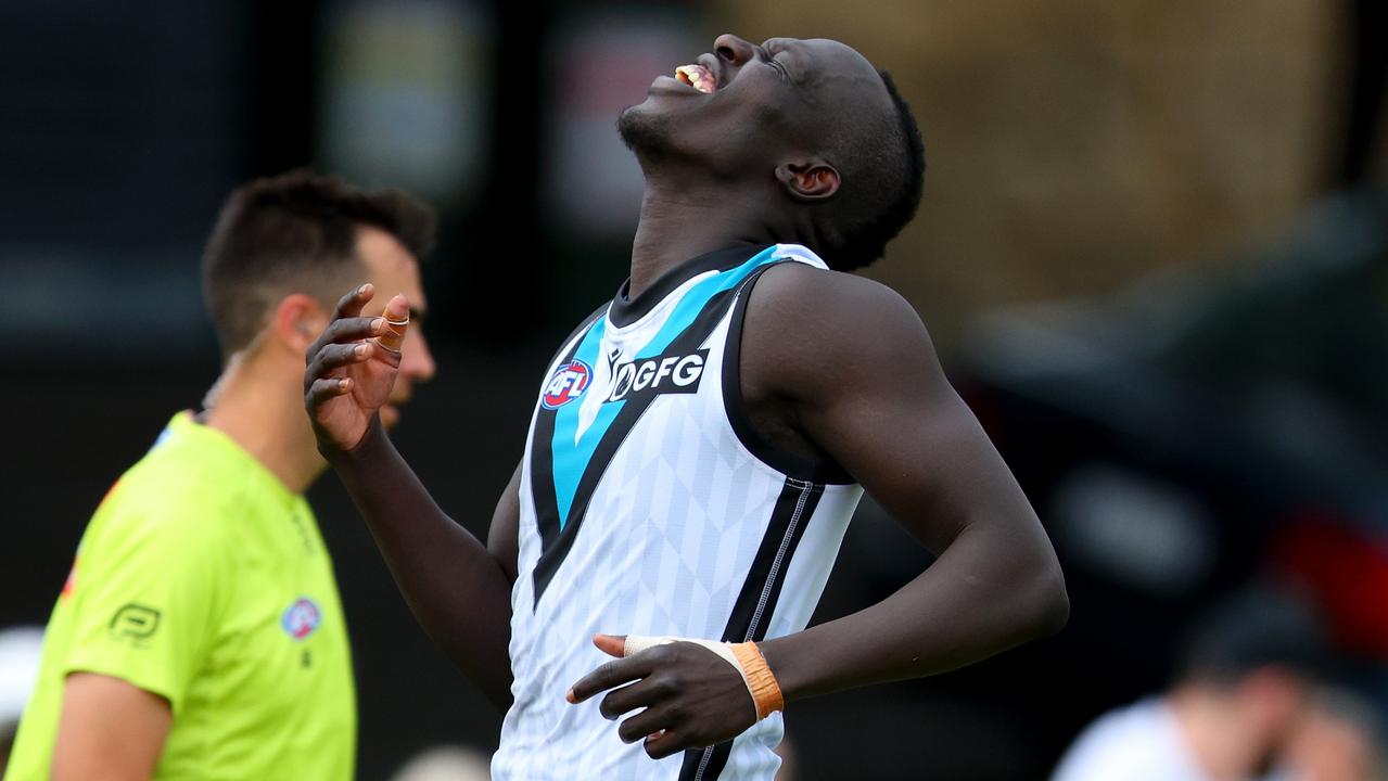 Aliir Aliir reacts after a botched kick. (Photo by James Worsfold/AFL Photos/via Getty Images)