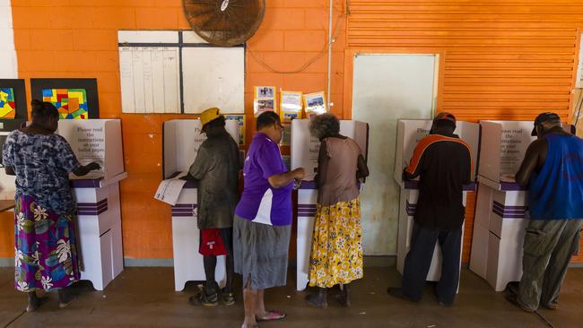 People at a mobile polling booth at Warruwi on Goulburn Island east of Darwin on the first day of mobile polling for the 2013 federal election.