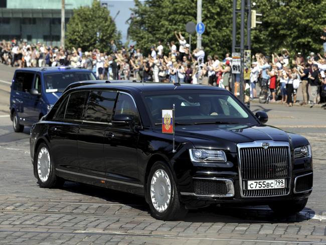 The motorcade and Kortezh limousine carrying Russian President Vladimir Putin.