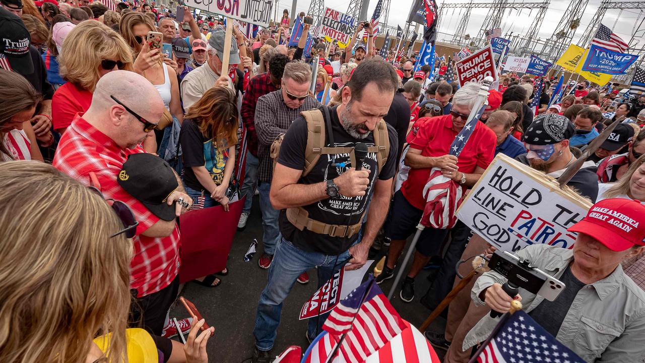 Supporters of US President Donald Trump pray in front of the Maricopa County Election Department while votes are being counted in Phoenix, Arizona. Picture: Olivier Touron/AFP