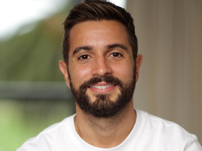 Michael Zullo pictured at his home in Rushcutters Bay with his favourite item which is his wedding ring.Picture: Christian Gilles