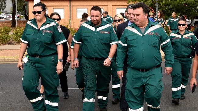 Ambulance driver Matthew James McLean, centre, outside court with supporters during an earlier appearance.