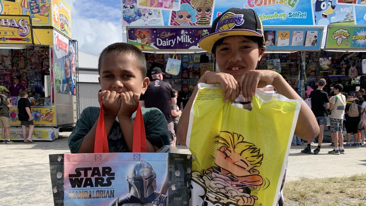 Maurice Smith and Wade Bennett show off their showbags at the Mackay Show on Thursday, June 16. Picture: Duncan Evans