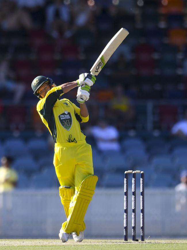 Josh Philippe on his way to a half century when playing for the Prime Minister's XI against South Africa at Manuka Oval. Picture: AAP Image/ Lukas Coch