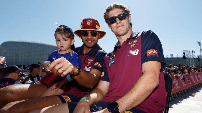 Callum Ah Chee (left) and Deven Robertson enjoy the parade. Picture: Getty Images