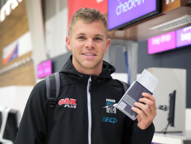 Port Adelaide leaves for China. Dan Houston who didn't make the trip, gets to go this time. At Airport 14 May 2018. (AAP Image/Dean Martin)