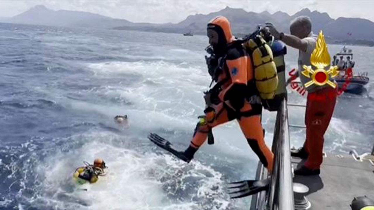 Divers off Porticello on the site where the British-flagged luxury yacht Bayesian sank with 22 people onboard. Picture: Handout/Vigili del Fuoco/AFP