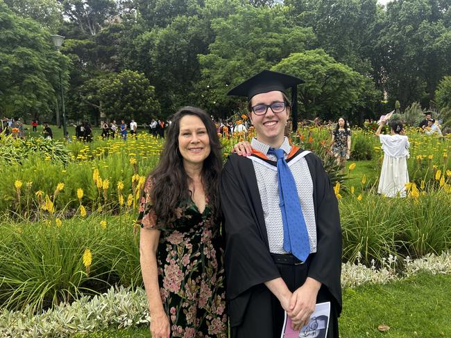 Alexi O’Keefe, pictured with mum Laura Cooney, graduates with a Bachelor of Design at the University of Melbourne's Faculty of Architecture, Building and Planning graduation ceremony at the Royal Exhibition Building on December 6, 2024. Picture: Harvey Constable