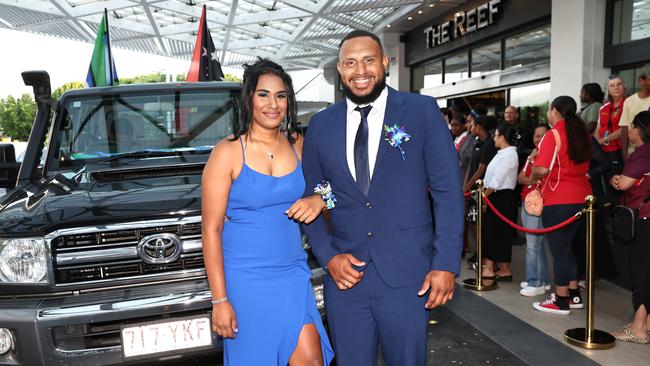 Micfreda Kiwat and Gideon Gela arrive at the Mount St Bernard College senior formal evening, held at the Pullman Reef Hotel Casino. Picture: Brendan Radke