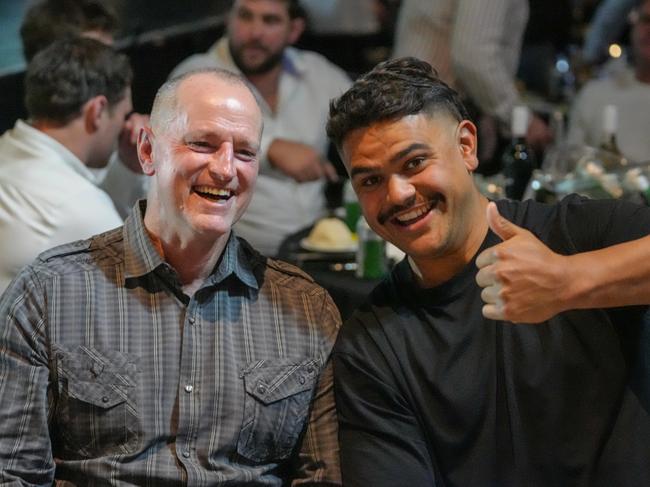 Michael Maguire and Latrell Mitchell in discussion at the 10-year reunion of the Rabbitohs' 2014 premiership win at Souths Juniors. Credit: Rabbitohs,
