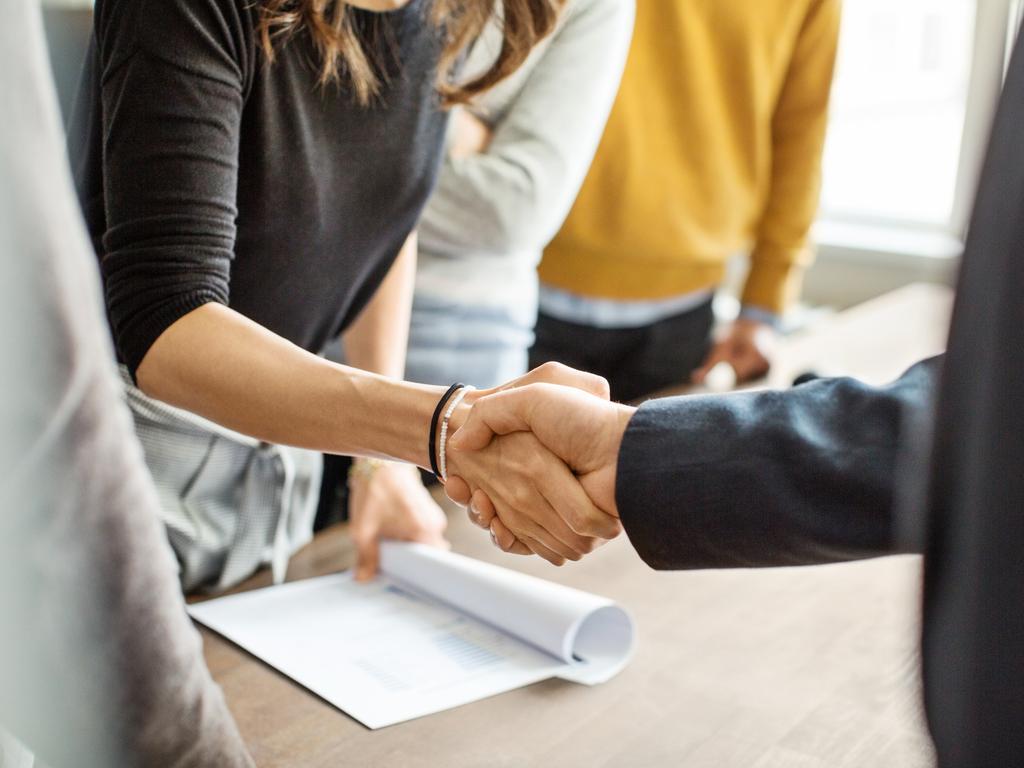 A firm handshake is one of the most popular ways to greet someone. Picture: istock