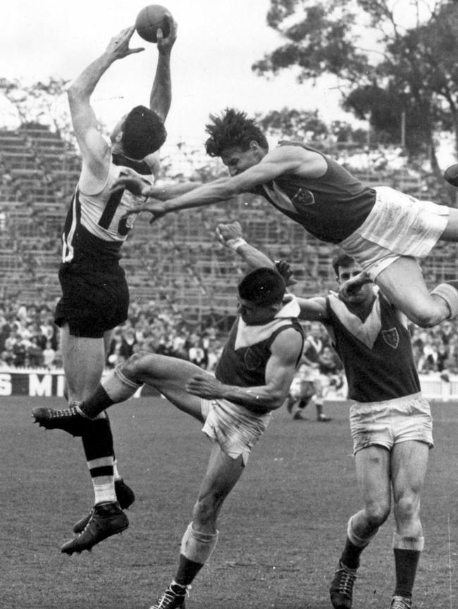 North Adelaide’s Don Lindner is outmarked by Port Adelaide’s Bob Philp in a 1965 clash.