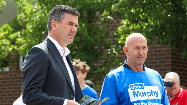 Werribee by Election. State opposition leader Brad Battin hands out how to vote flyers at the polling booth at Manor Lakes P-12 College. Picture: Ian Currie.